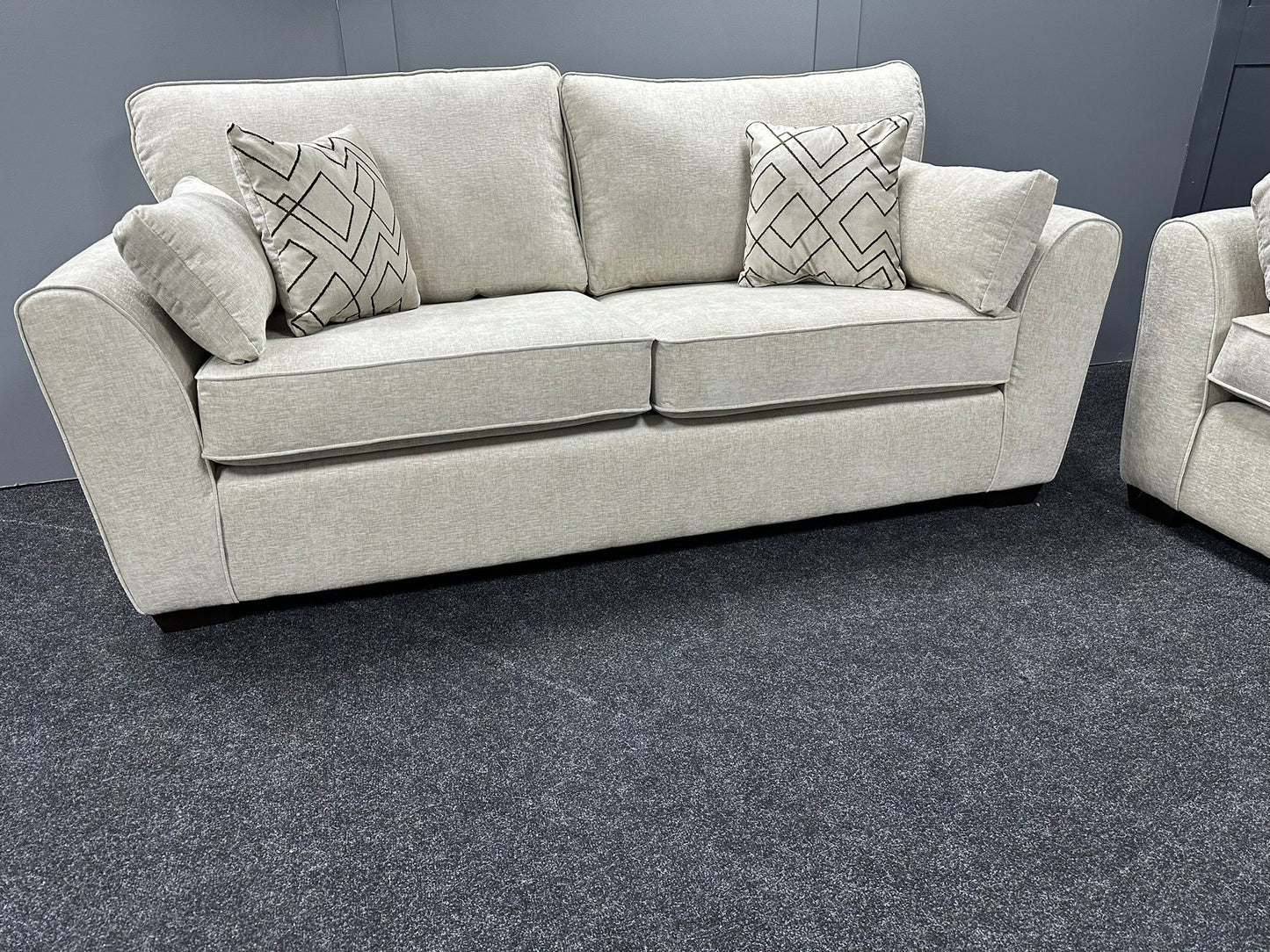 Cream 2 seater sofa